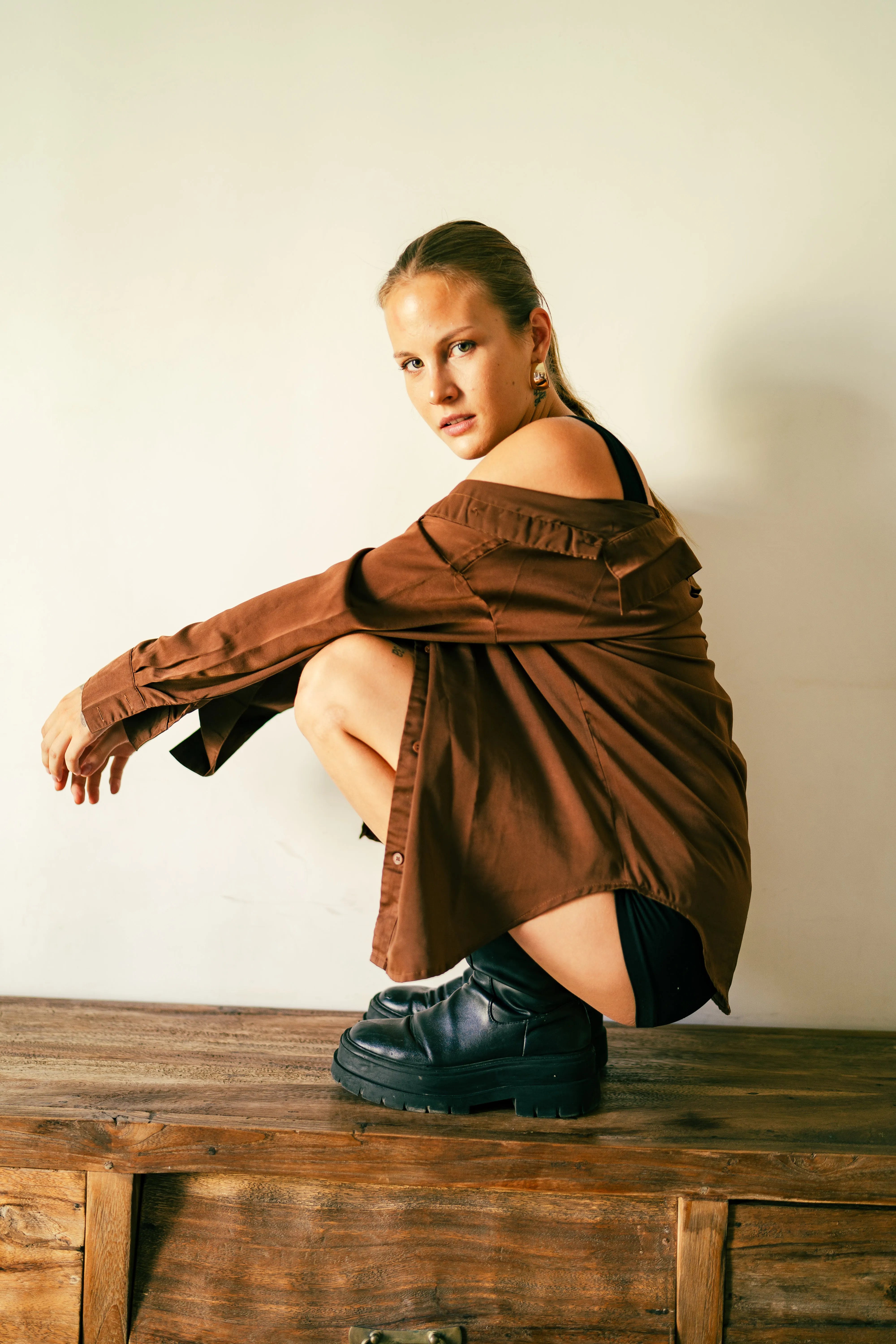 Outdoor fashion photography with natural lighting and environment